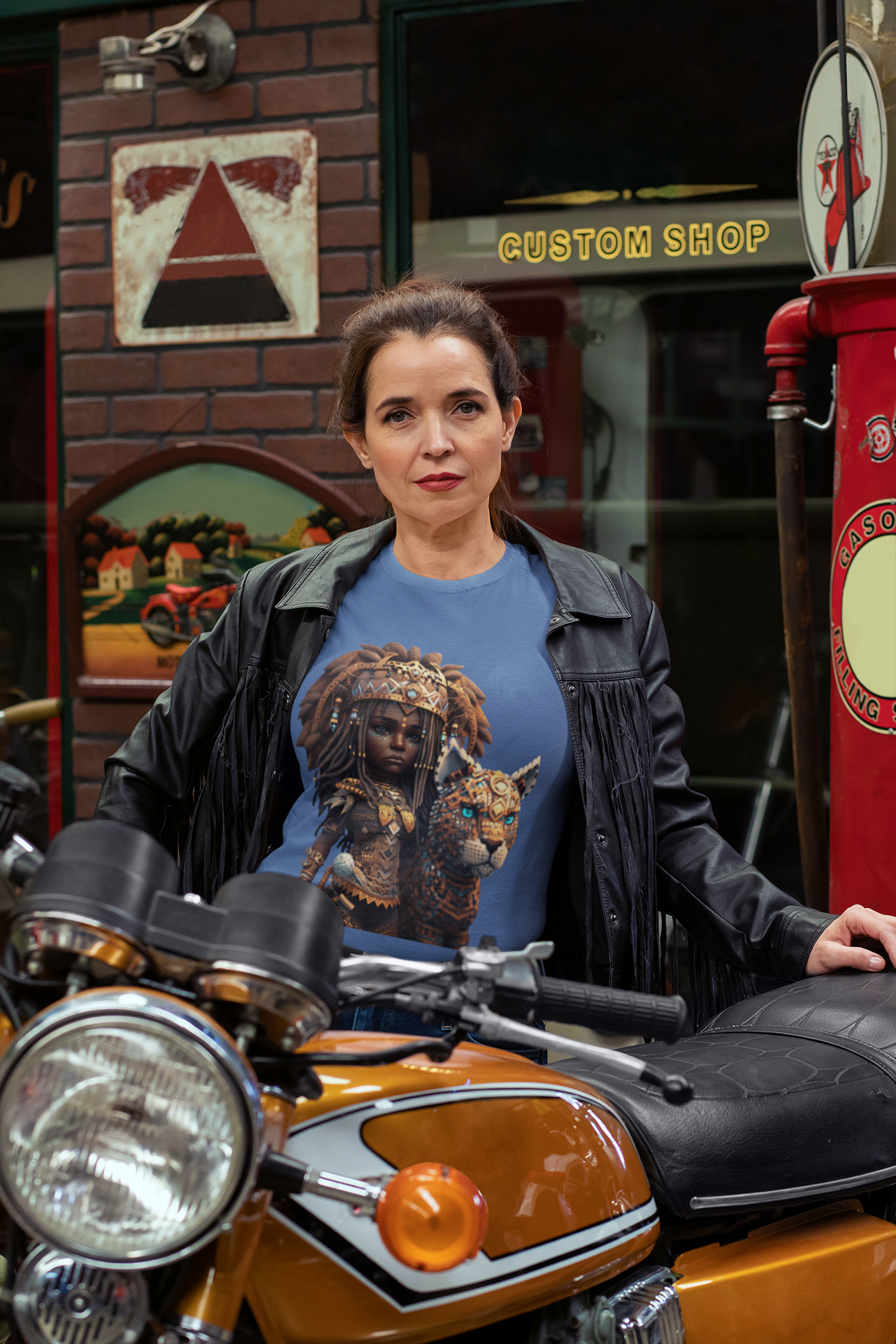 royal blue colour t-shirt which has a design of a pop anime African princess with her leopard pet worn by a fierce woman with her motorcycle